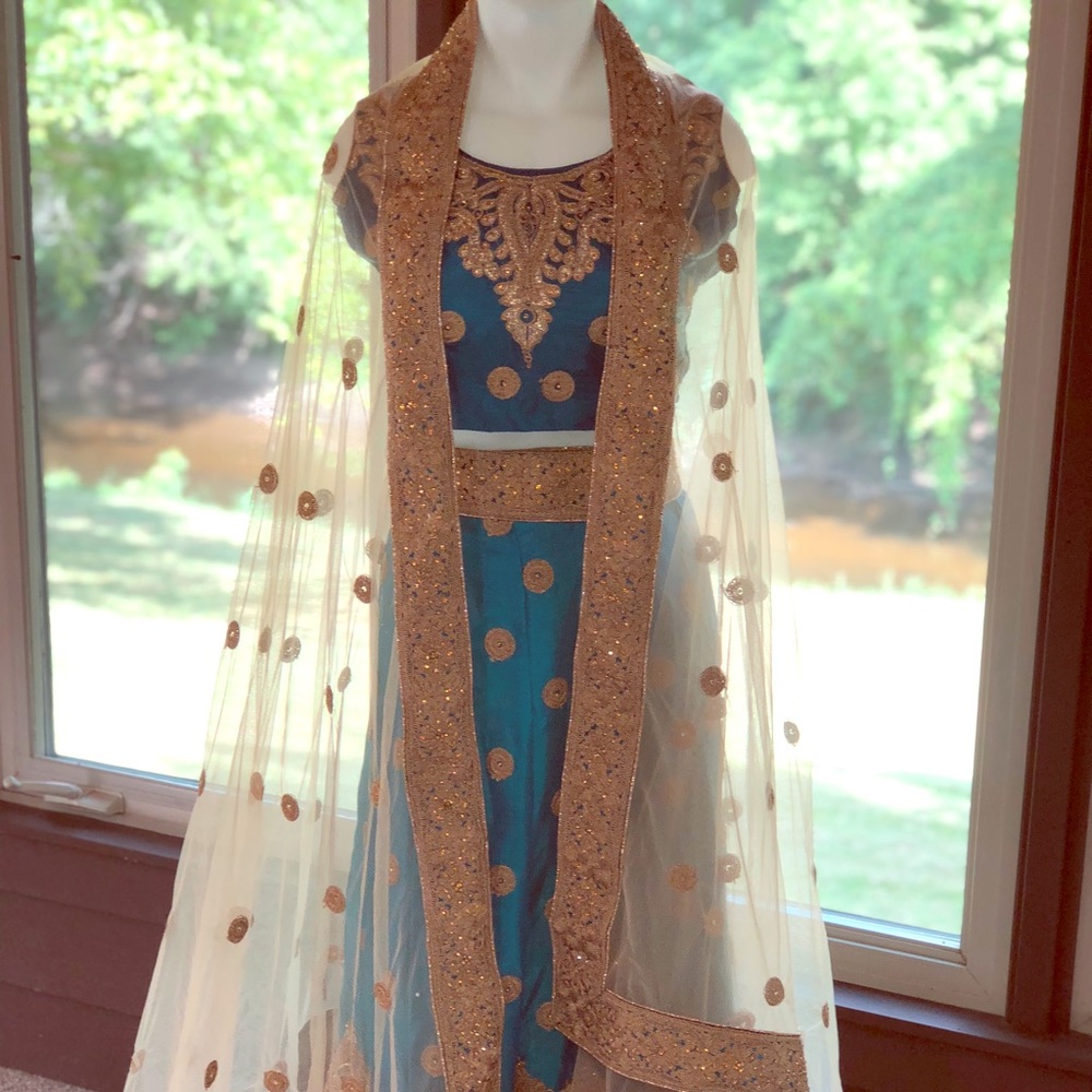 Women’s custom embroidered sari of silk blend.